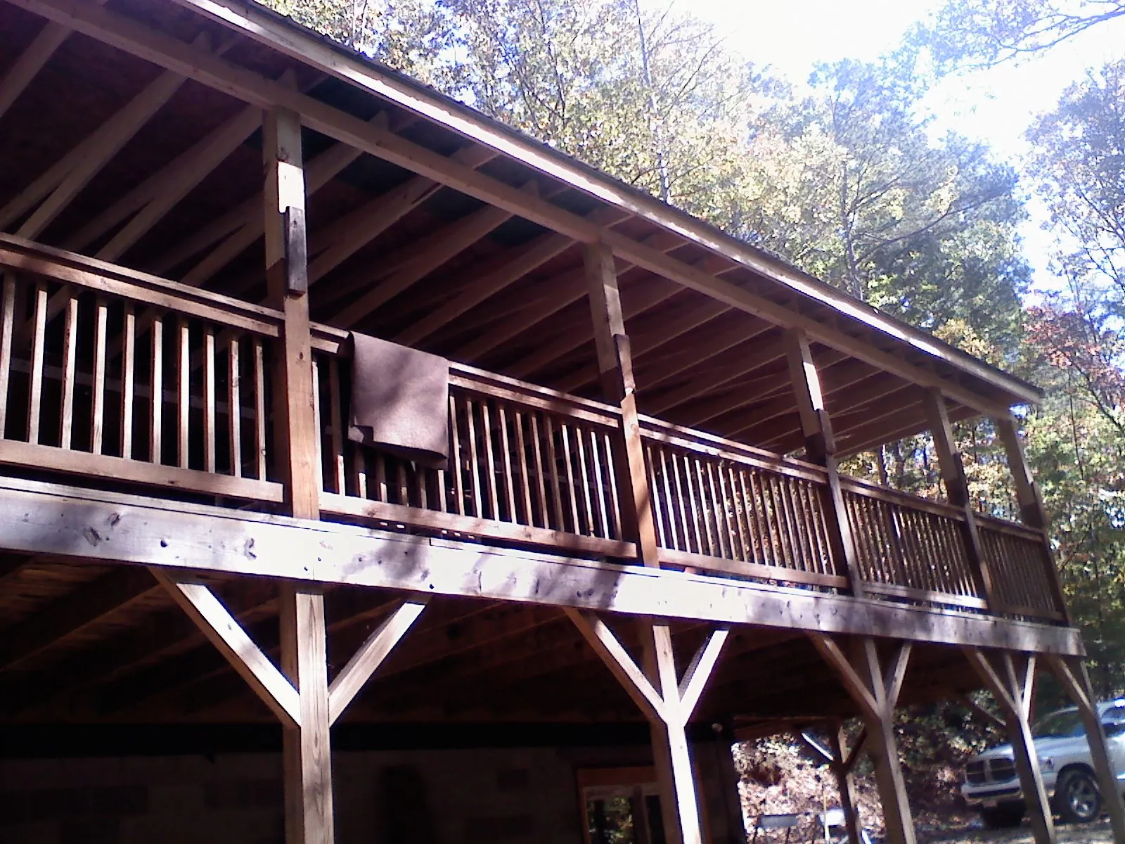 Timber framing under a new elevated porch and deck — Roof Leak Repair in Pine Mountain Valley by Roofing Brothers